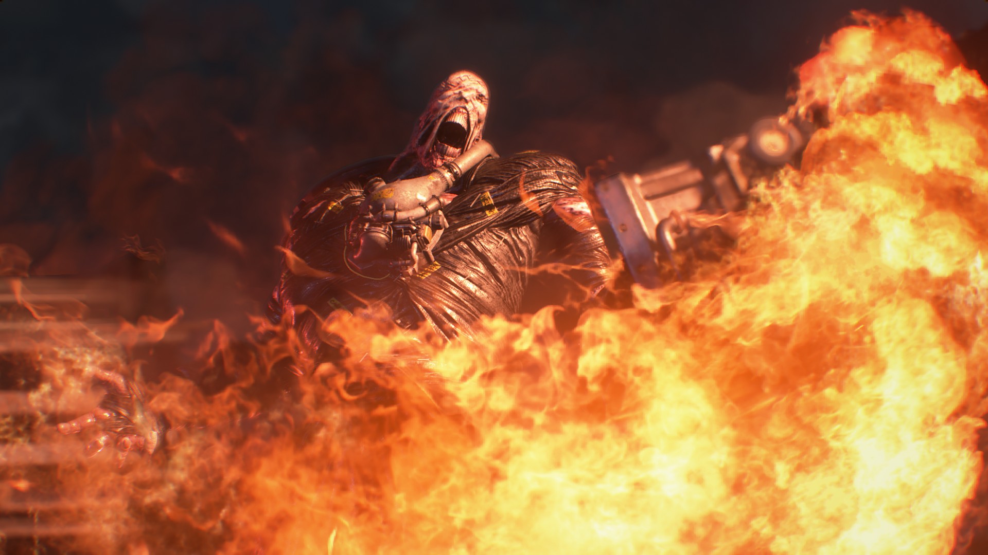Cena do jogo Resident Evil 3: O mutante Nemesis brande ameaçadoramente um lança-chamas pela tela, da esquerda para a direita. Nemesis é um monstro humanóide de pele bege e esticada, careca, coberto por um tecido plástico negro com tubos por cima de seu peito. Em sua cara, vemos um olho esquerdo pálido aberto e sua bocarra aberta em um grito. Ele segura a arma com a mão esquerda, formando um arco na parte de baixo da tela. Por entre as chamas, vemos o resto de seu corpo e o fundo escurecido da tela