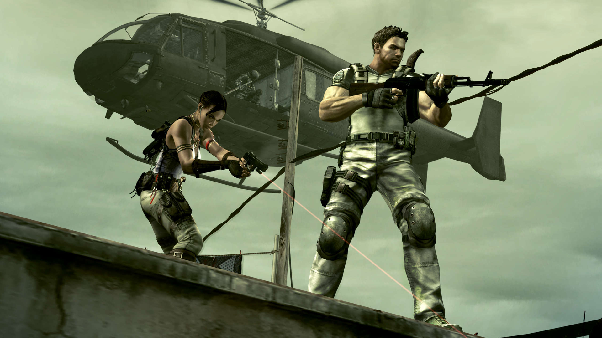 Cena do jogo Resident Evil 5. Chris (à direita) e Sheva (à esquerda) estão no telhado de uma construção, apontando para baixo, enquanto um helicóptero preto se aproxima por trás. Chris, segurando um rifle de assalto com ambas as mãos, é um homem caucasiano de cabelos pretos e curtos, usando uma calça bege e uma camiseta clara com um emblema no ombro direito. Ele usa joelheiras por cima da calça e carrega um coldre de pistola na perna direita. Em suas costas, vemos o cabo de um facão aparecendo atrás de seu ombro esquerdo. Sheva é uma mulher negra de cabelos pretos, usando uma calça verde e uma camiseta regata roxa. Ela segura uma pistola com mira laser em ambas as mãos e seus ombros e seu pescoço são adornados por tiras e contas. Ela possui um cinto e bolsos amarrados na perna direita. Em suas costas podemos ver que há outra arma. O helicóptero que se aproxima atrás deles está de portas abertas e podemos ver um soldado de uniforme escuro pegando uma arma grande. O céu atrás deles é pálido.